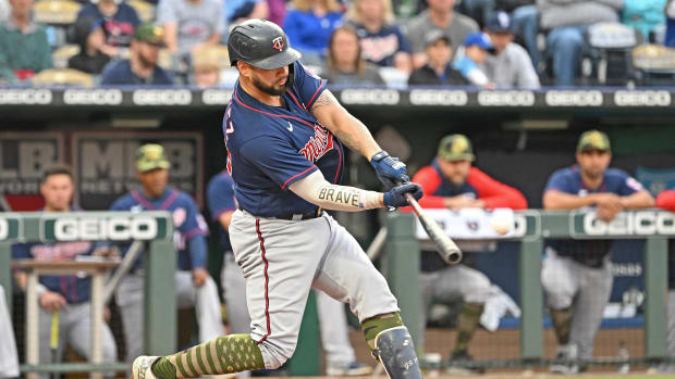 May 20, 2022; Kansas City, Missouri, USA; Minnesota Twins catcher Gary Sanchez (24) hits an RBI double during the first inning against the Kansas City Royals at Kauffman Stadium. Mandatory Credit: Peter Aiken-USA TODAY Sports